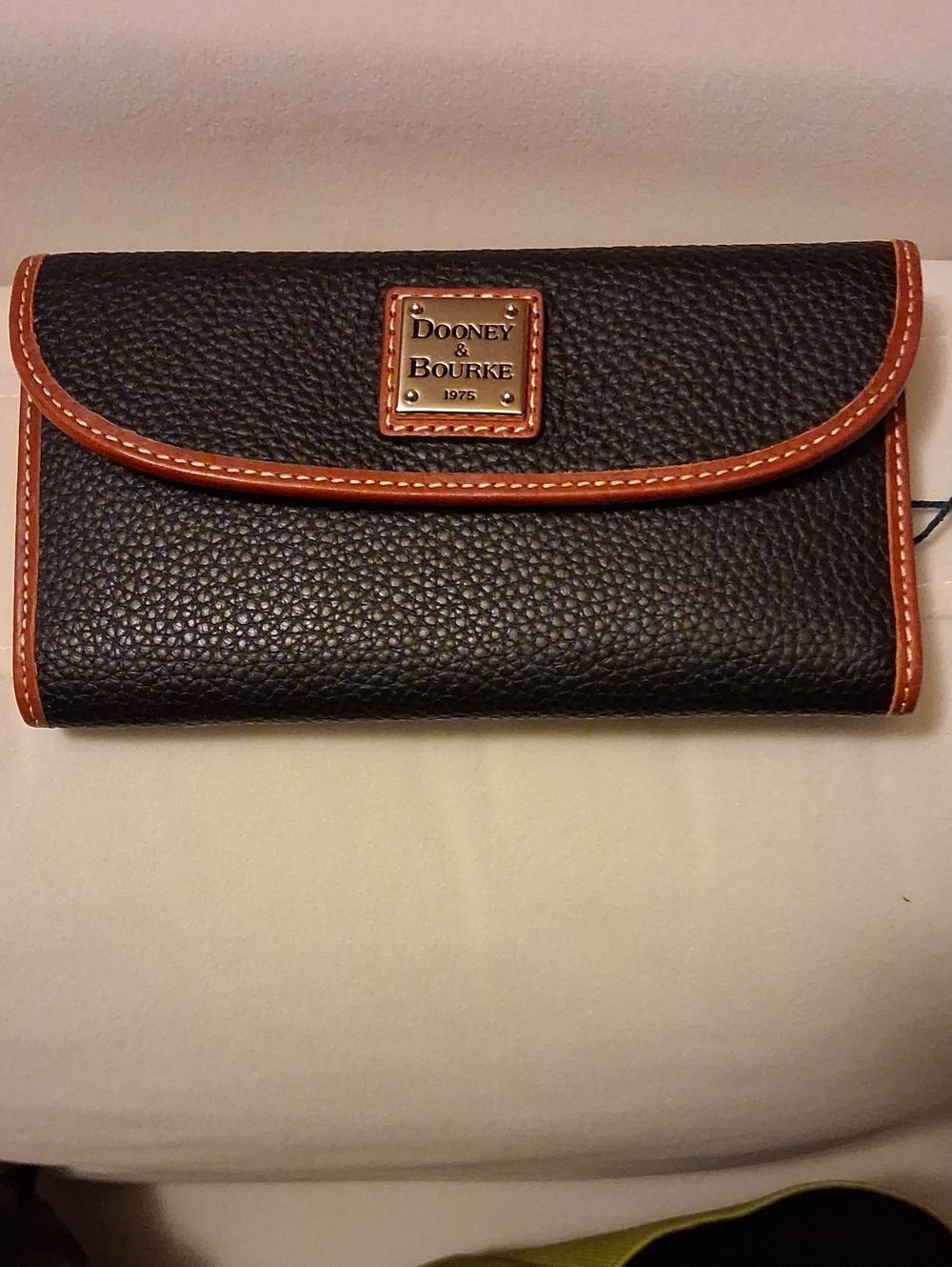 Dooney & Bourke Black Pebble Leather Wallet with Brown Trim